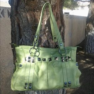 Very cute green Kathy van zeeland purse/bag